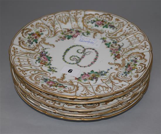 A set of five gilt and floral Paris porcelain plates